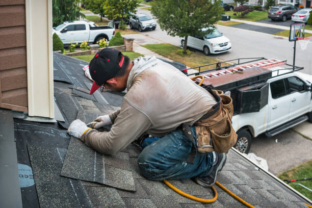 Professional Gutter Repair And Installation technician working in Harwood, ND